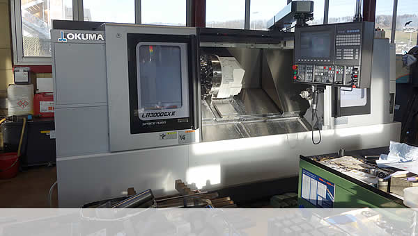 <b>OKUMA LB3000 EXII</b> - Ø 410 mm x 1300 mm mit Antivibrations Software